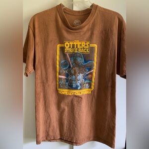 The Duck Company spoofed Star Wars “The Otters Strike Back” Brown Graphic Tee